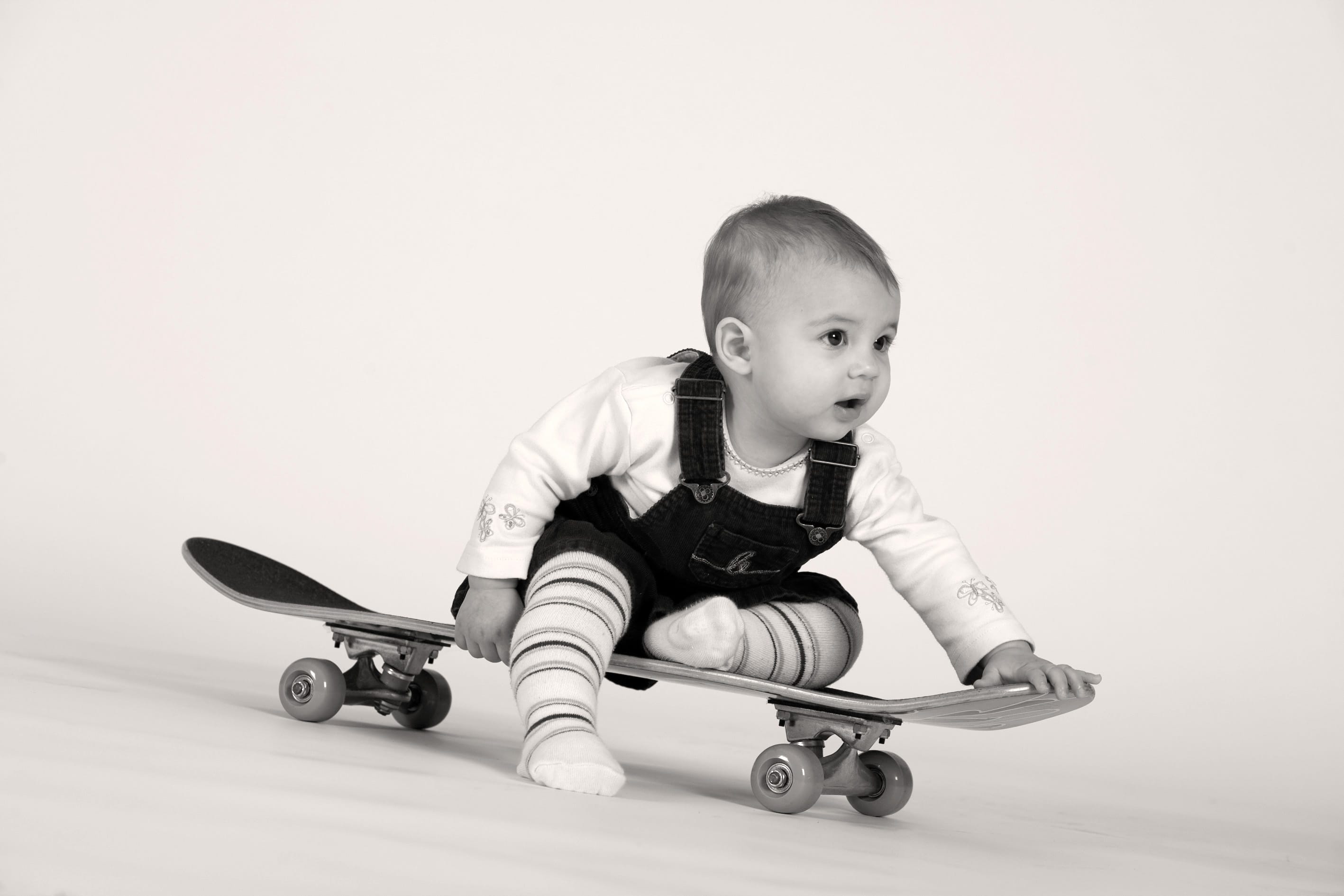 Fotoshooting - Kind auf einem Skatboard Fotoshooting - Kind auf dem Skatboard