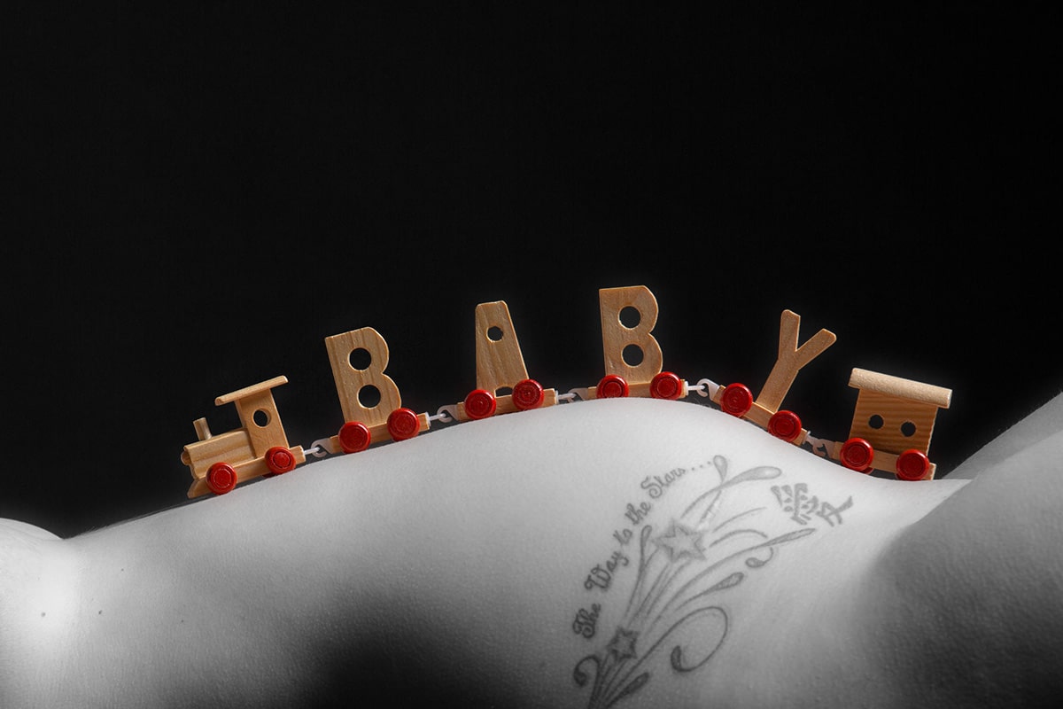 Babybauchfoto mit Zug Fotostudio Keepsmile Castrop-Rauxel